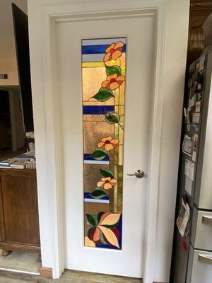 Hung door with backlight from pantry