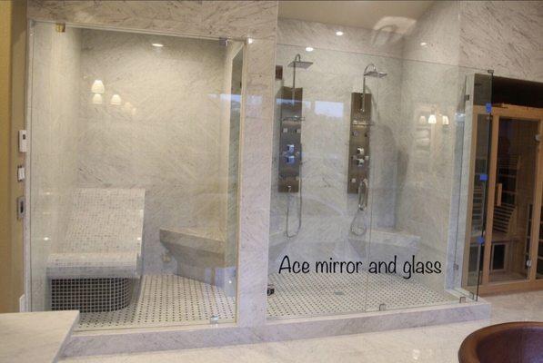 Frameless shower enclosure with starphire glass