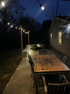 After photo a recent renovation.  New walkway, sod, lighting, paver patio and sitting wall.