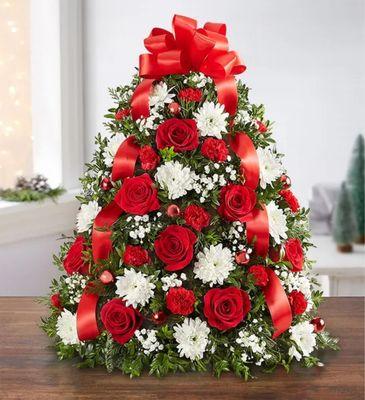 We love Christmas. https://www.nenasflorist.com/product/holiday-flower-tree/