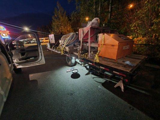 Suquamish Washington roadside service on flat bed trailer.  Electric brakes, and hub needed repair.