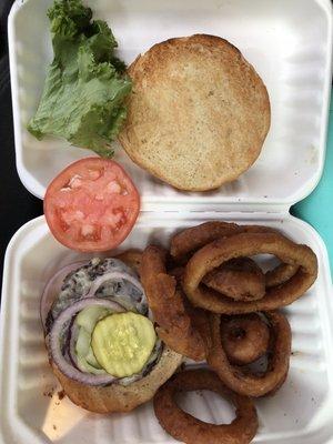 Small overcooked burger on an over sized bun and overcooked onion rings. $0.50 for that onion slice $20.63!!!!