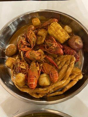 Pound and a half of crab, scallops, and crawfish in O Crab seasoning.