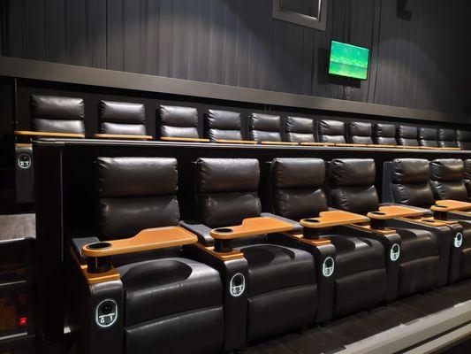 Plush, reclining seating with trays