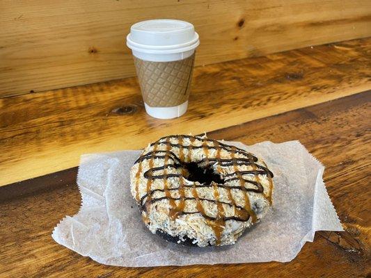 Hiding beneath the mountain of sugary toppings is a stale chocolate doughnut. Looks better than it was.