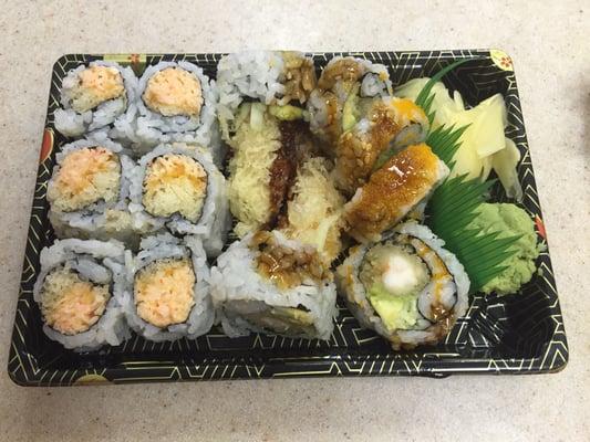 Spicy crab roll alongside a shrimp tempura roll