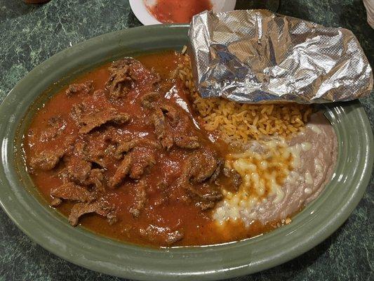 Chile Colorado with beans, rice and tortillas