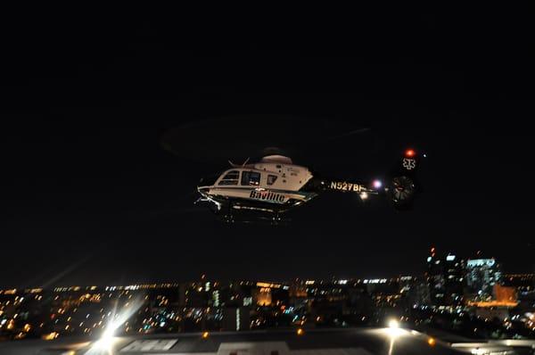 A night-time med flight chopper landing at All Children's