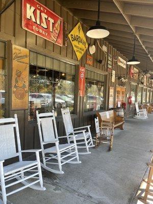 Signature front porch at all Cracker Barrel restaurants with rockers for waiting customers. Rockers can be purchased, too.