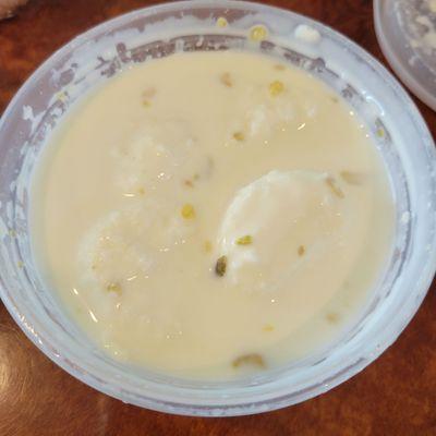 Indian sweet milk dessert with some sort of rice clusters - tasty