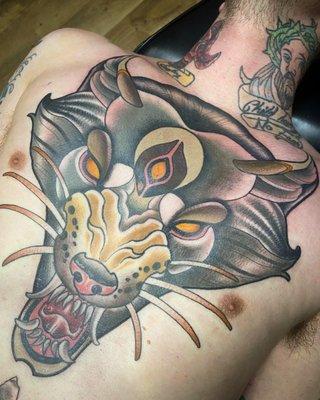 Wolf chest tattoo by Zac