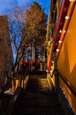 The stairway to heaven - there is a parking lot upstairs that leads directly to the patio !