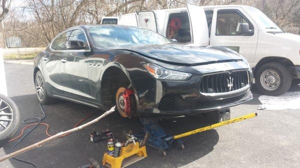 Front brake and rotors on a Maserati Ghibli