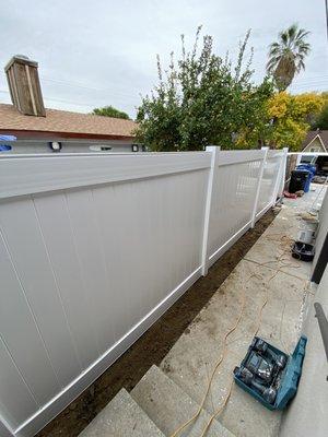 Another view of my new 8foot fence being installed.