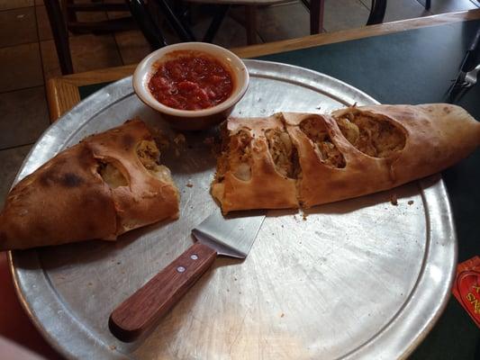 Large chicken steak stromboli. One piece already removed and consumed. :)