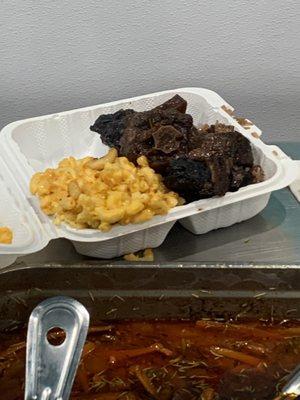 Ox tail, mac and cheese, rice & peas