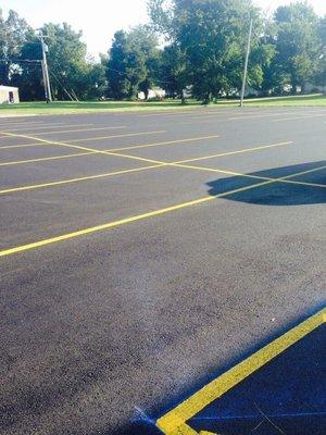 New resurfaced parking lot.