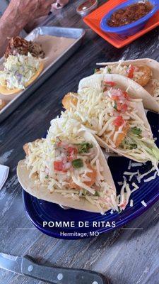 Crispy fish tacos, hickory beans, pulled pork and slaw