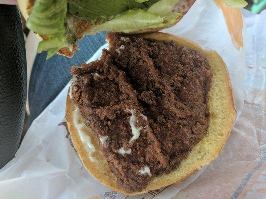 This is their new crispy chicken sandwich. It's very clear that it has been quite some time since they changed the oil in the fryers. Gross!