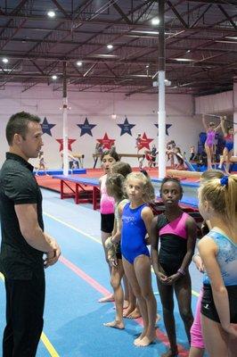 Coach Zander with the Level 6 team girls!