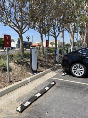 Tesla chargers are located in the Stonewood Center mall parking lot near Firestone Blvd