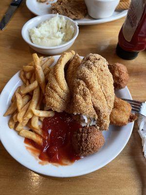 Catfish, butterfly shrimp, hush puppies and fries.