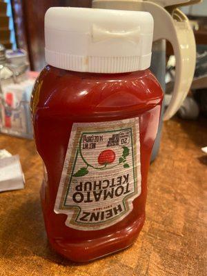 Refilled ketchup.  Might be fine in New York but not AZ.  Where is the health dept.