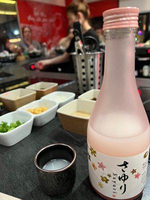 Nigori sake and condiments.