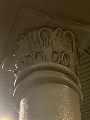 Original "female anatomy crown molding" on the pillars outside one of the buildings in the red light district.