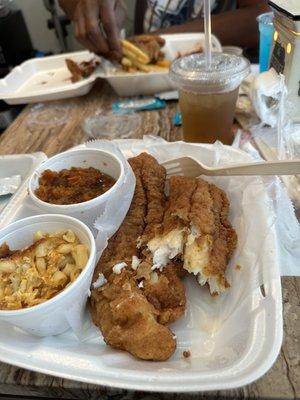 Catfish (2pcs), Mac n cheese and yams. Chicken wings and fries in the back. Long Island