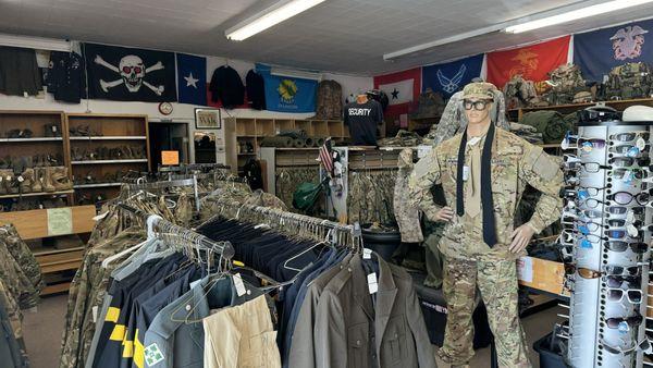 Left side of the store. Boots, uniforms (flight crew, ACUs, dress, PTs, etc.).