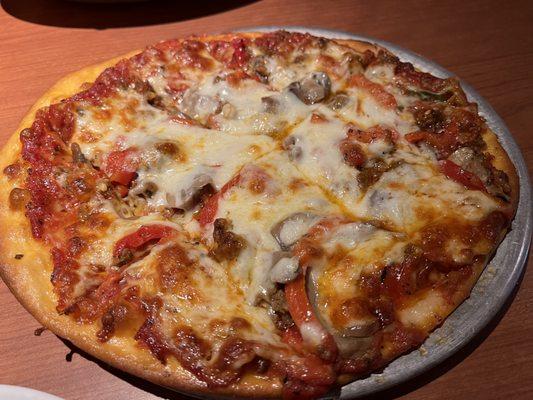 Small pizza of sausage, mushroom & roasted red peppers