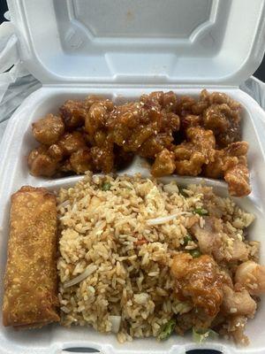 Sesame chicken, egg roll, and chicken and shrimp fried rice