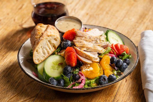 Warm Grilled Chicken 
salad with greens, pickled red onion, cotija, blueberries, strawberries, mandarins, cucumber, pecan, white balsamic