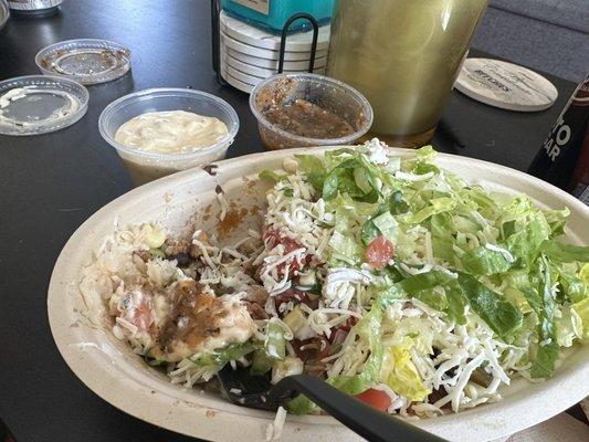 Chicken bowl with side verde and queso