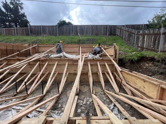 1150 sq ft ADU - detached hillside duplex, 2 rental units , stem walls framing    In rain or shine we work !