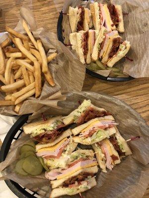 Club sandwiches and fries.