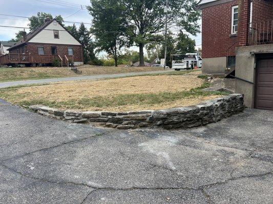 New retaining wall + seed & straw!