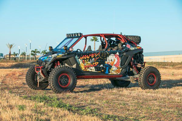 AMAZING CUSTOM DESIGN ON THIS RZR. WE WRAPPED WITH AARLON ILLUMINITE REFLECTIVE WRAP!