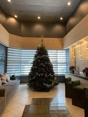 Christmas tree in lobby smells nice.