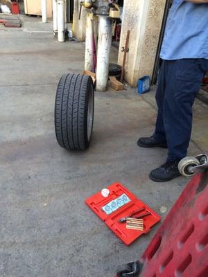 Tire repair! They made it look super easy and quick!