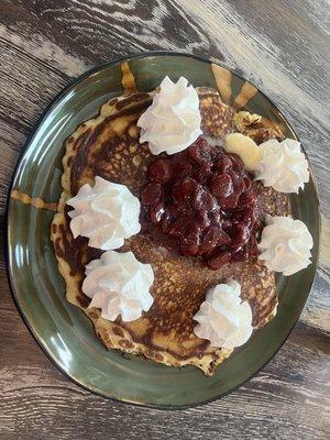 Pancake with strawberries and whip cream