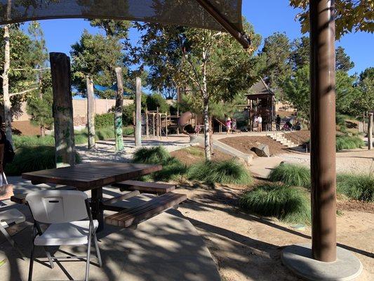 A few picnic tables available under the gazebo shade for parents to mingle 07.07.22