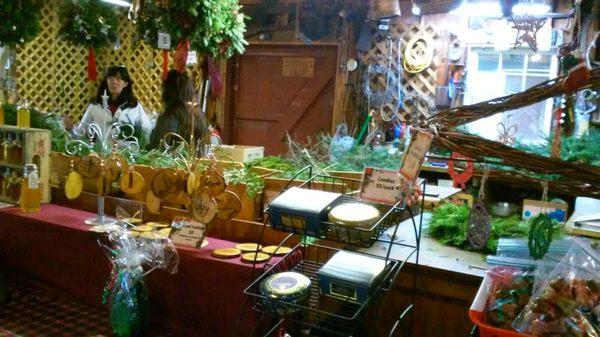 Inside the store, offering wreaths, ornaments, and honey ....