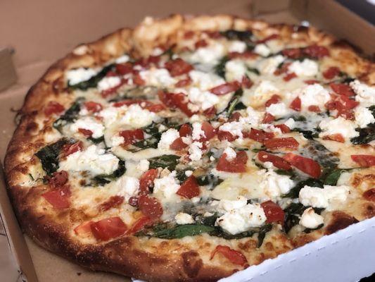 Spinach white pizza