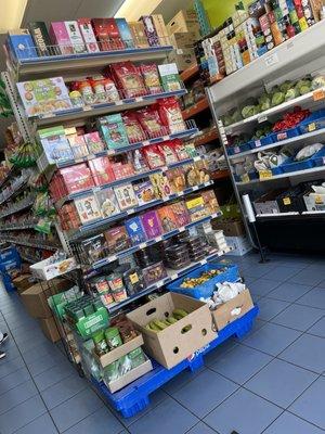 Shelves stocked full of delicious items and produce.