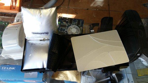 Client's Macbook Battery Expanded Causing Damage to Touchpad