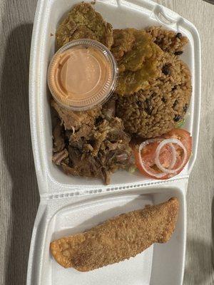 Pernil w/ arroz con gandulees, tostones, empanada de carne