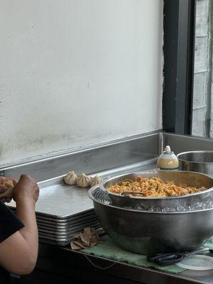 This place is fire! Come for their homemade momos all made by hand! Orange is this summer's color!