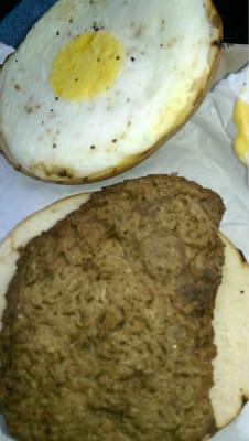 Steak, egg and cheese bagel inside view. It looks really fake compared to real steak and eggs.